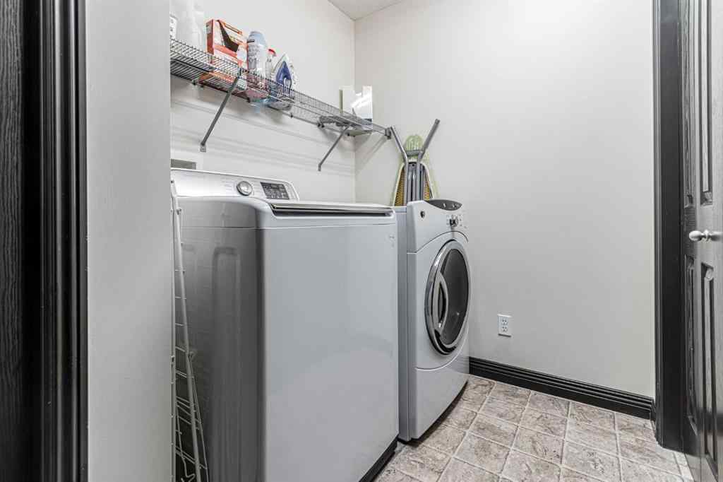 MLS® A2266274 - 1430 Kings Heights Boulevard SE in Kings Heights Airdrie, Residential