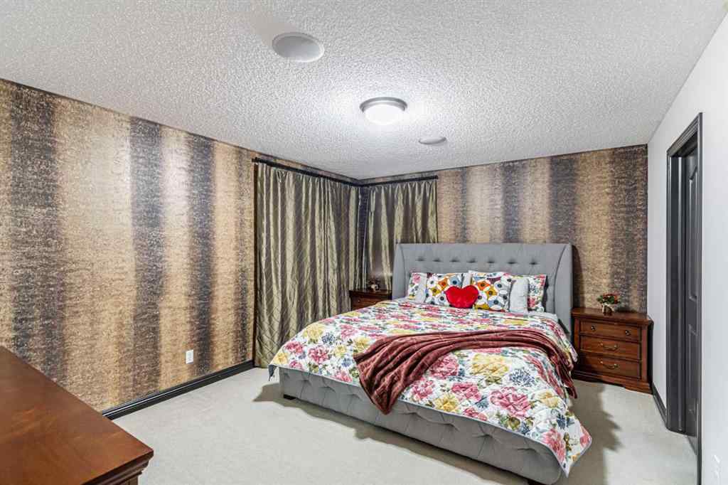 MLS® A2266274 - 1430 Kings Heights Boulevard SE in Kings Heights Airdrie, Residential