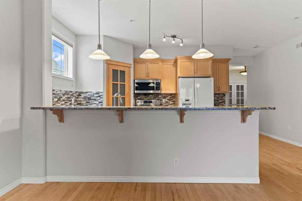 MLS® A2266277 - Unit #242 30 Sierra Morena Landing SW in Signal Hill Calgary, Residential