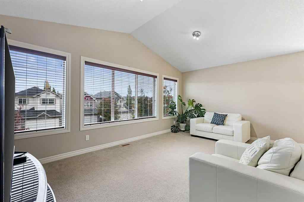 MLS® A2266291 - 341 Bridleridge View SW in Bridlewood Calgary, Residential