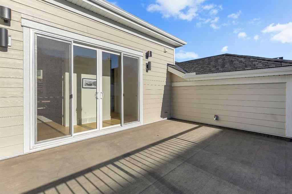 MLS® A2266298 - 210 Alexandria Green SW in Currie Barracks Calgary, Residential