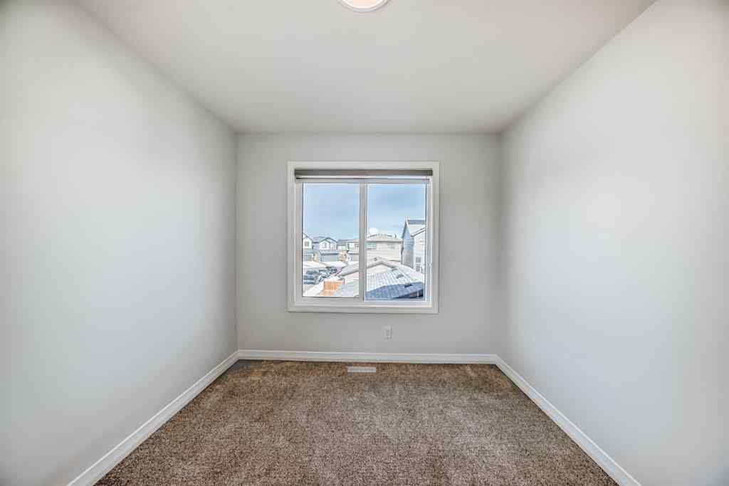 MLS® A2266305 - 120 Belmont Boulevard SW in Belmont Calgary, Residential
