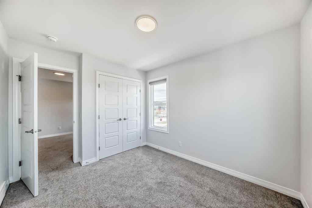 MLS® A2266305 - 120 Belmont Boulevard SW in Belmont Calgary, Residential