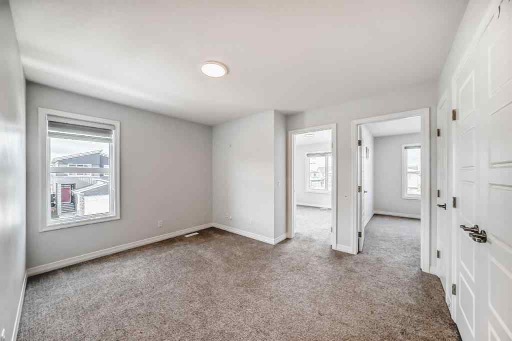 MLS® A2266305 - 120 Belmont Boulevard SW in Belmont Calgary, Residential
