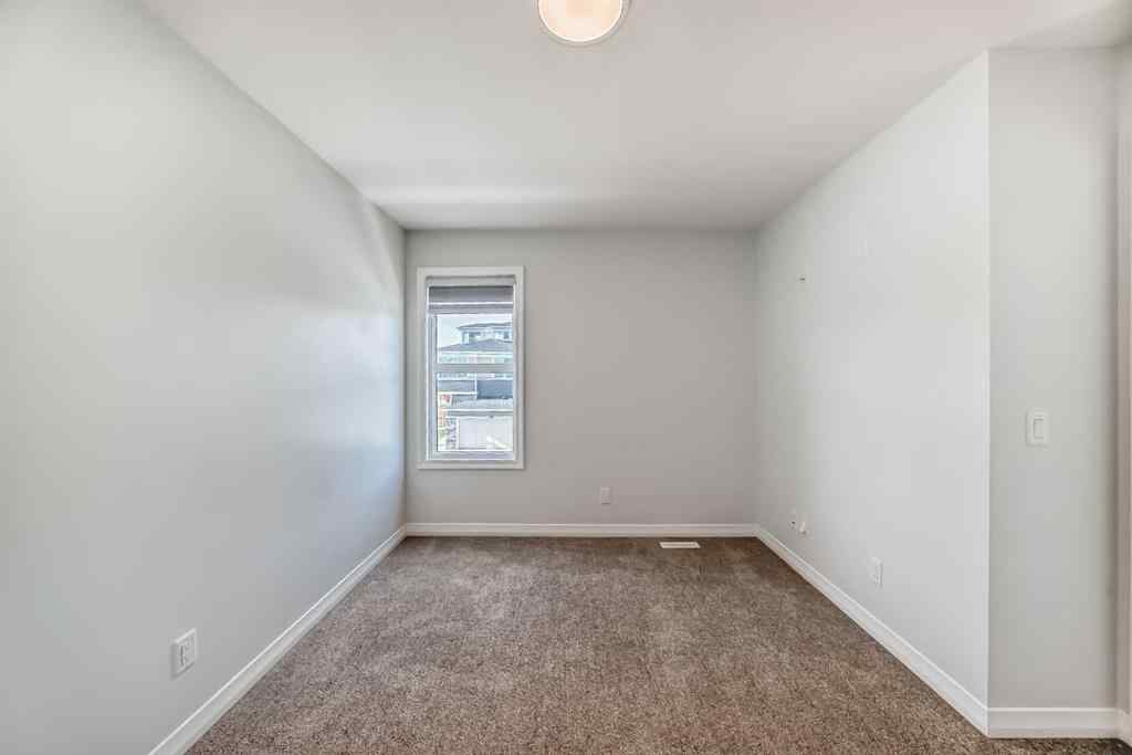 MLS® A2266305 - 120 Belmont Boulevard SW in Belmont Calgary, Residential