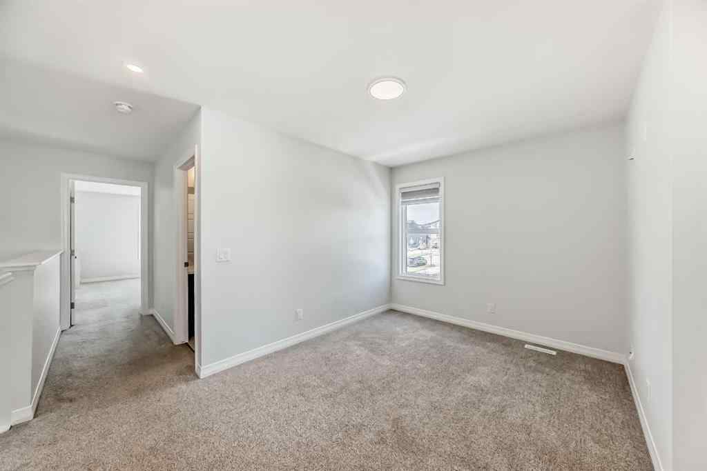 MLS® A2266305 - 120 Belmont Boulevard SW in Belmont Calgary, Residential