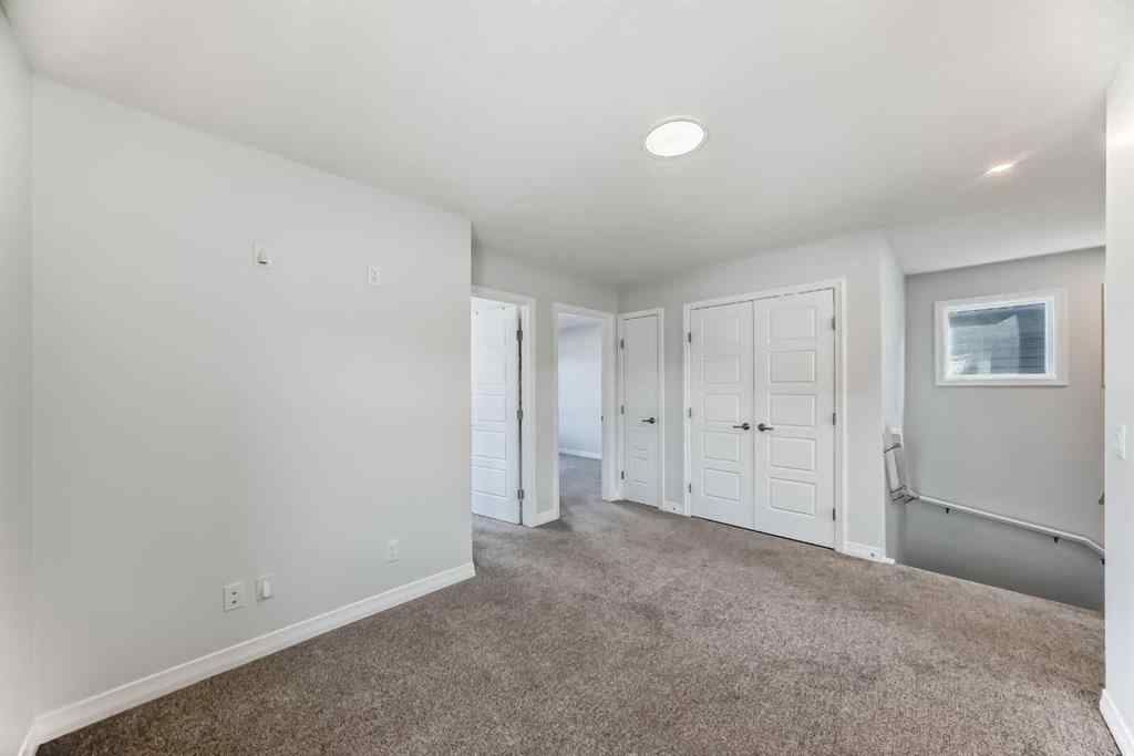 MLS® A2266305 - 120 Belmont Boulevard SW in Belmont Calgary, Residential