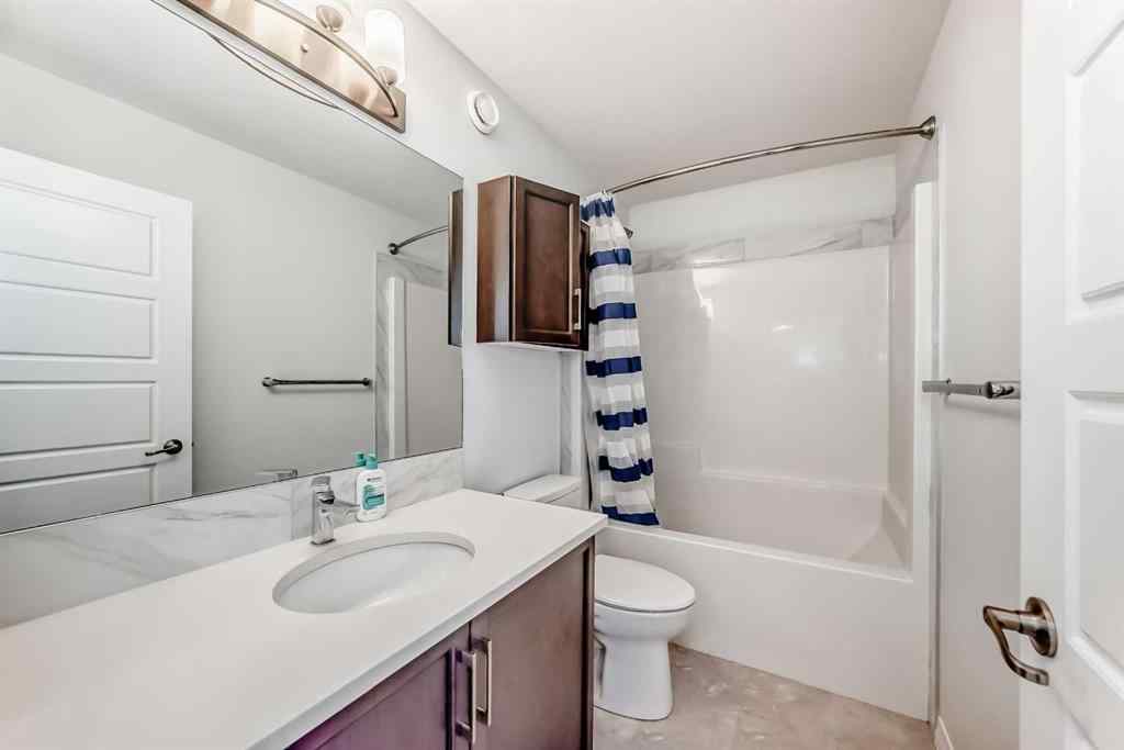 MLS® A2266305 - 120 Belmont Boulevard SW in Belmont Calgary, Residential