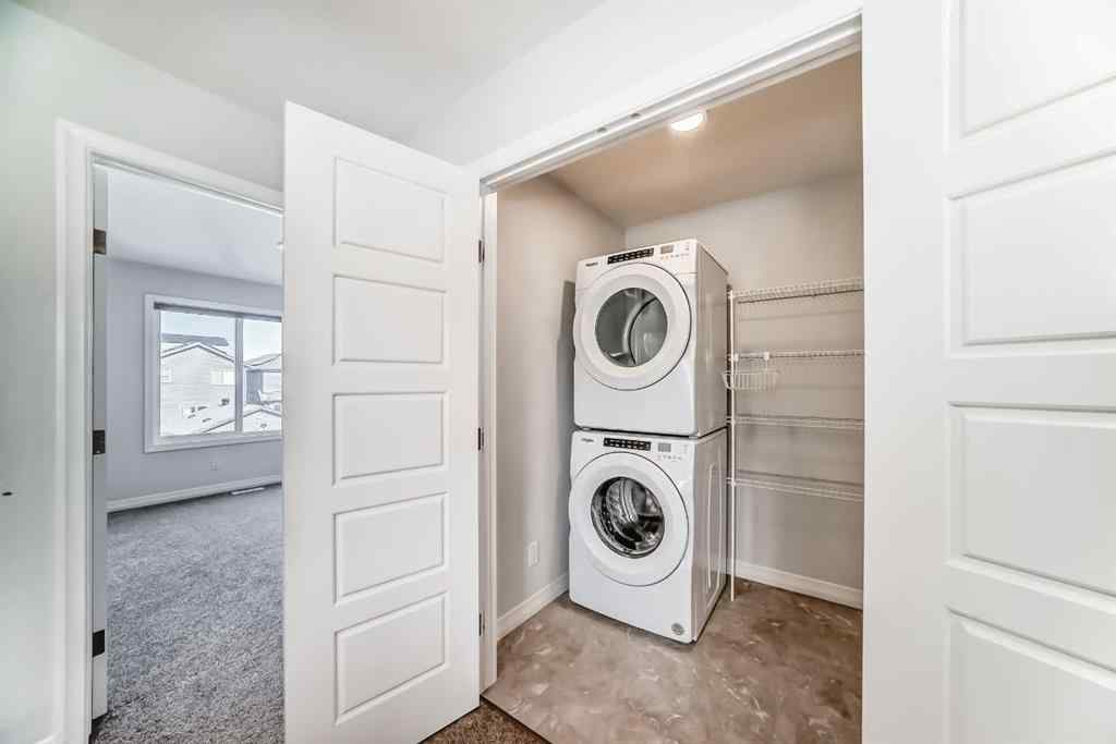 MLS® A2266305 - 120 Belmont Boulevard SW in Belmont Calgary, Residential