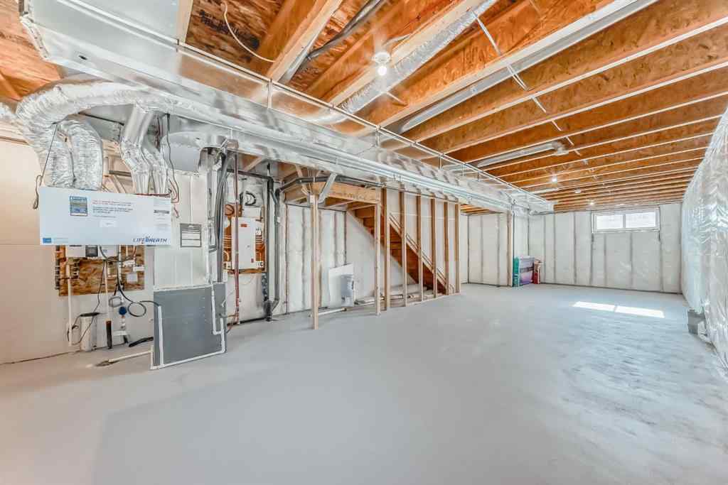 MLS® A2266305 - 120 Belmont Boulevard SW in Belmont Calgary, Residential