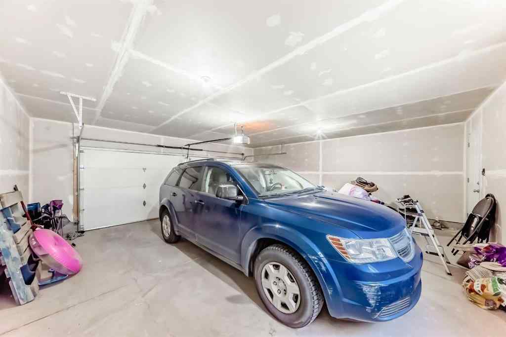 MLS® A2266305 - 120 Belmont Boulevard SW in Belmont Calgary, Residential