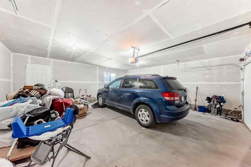 MLS® A2266305 - 120 Belmont Boulevard SW in Belmont Calgary, Residential