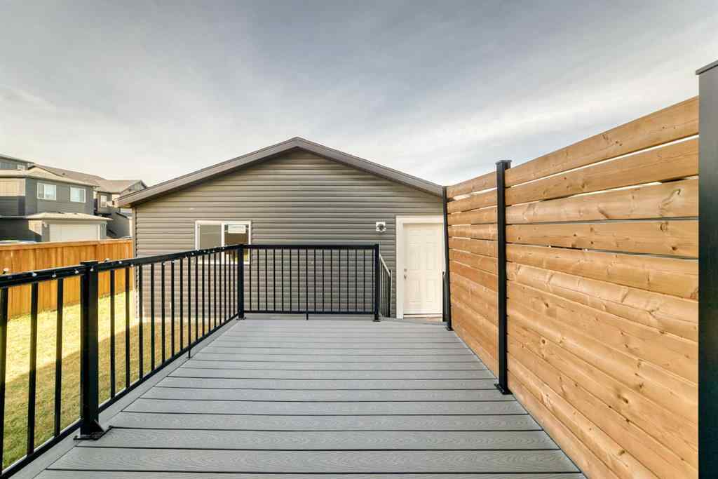 MLS® A2266305 - 120 Belmont Boulevard SW in Belmont Calgary, Residential