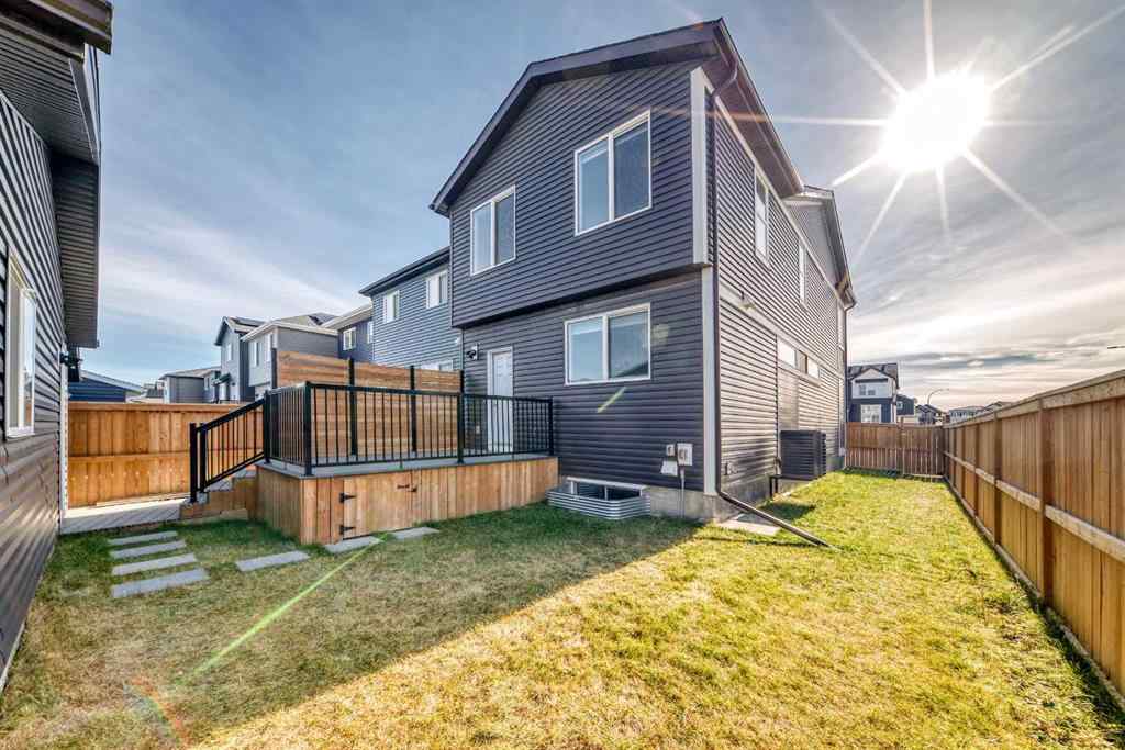 MLS® A2266305 - 120 Belmont Boulevard SW in Belmont Calgary, Residential
