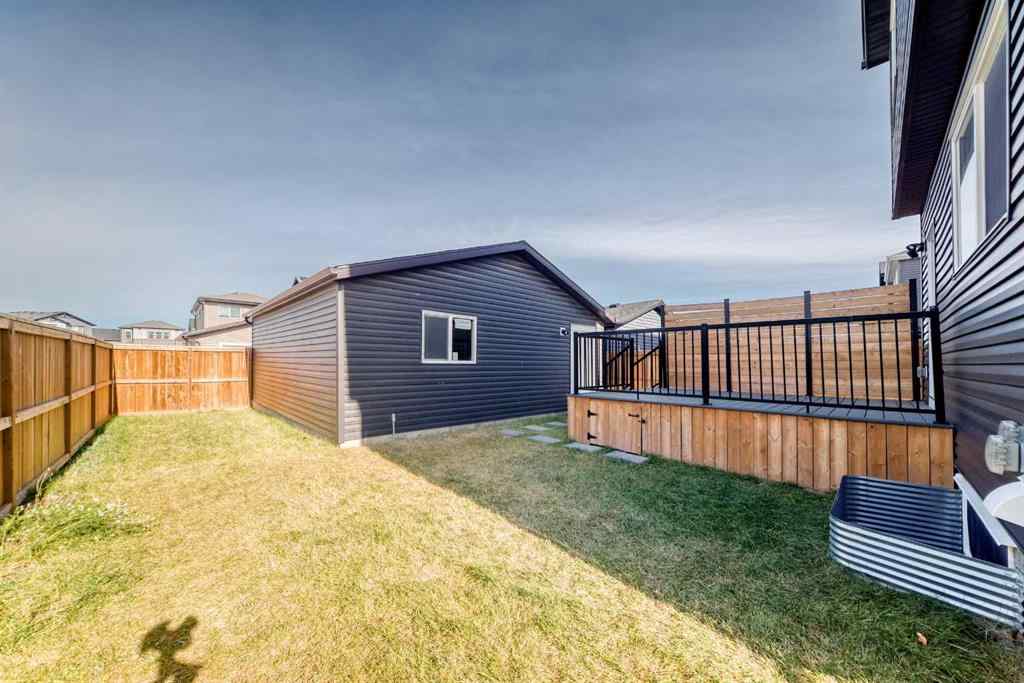 MLS® A2266305 - 120 Belmont Boulevard SW in Belmont Calgary, Residential