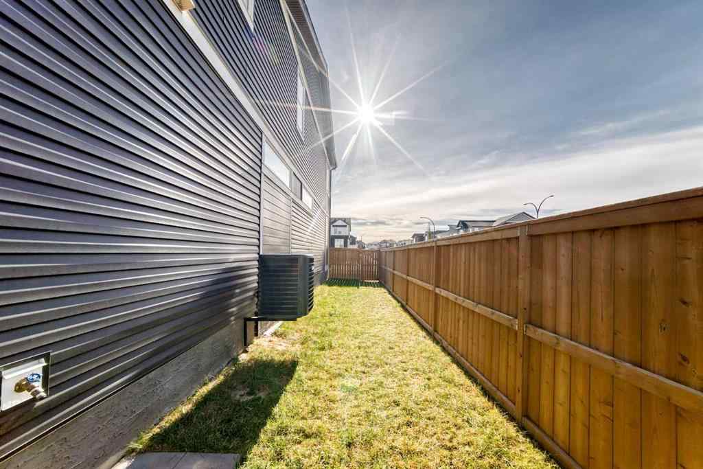 MLS® A2266305 - 120 Belmont Boulevard SW in Belmont Calgary, Residential