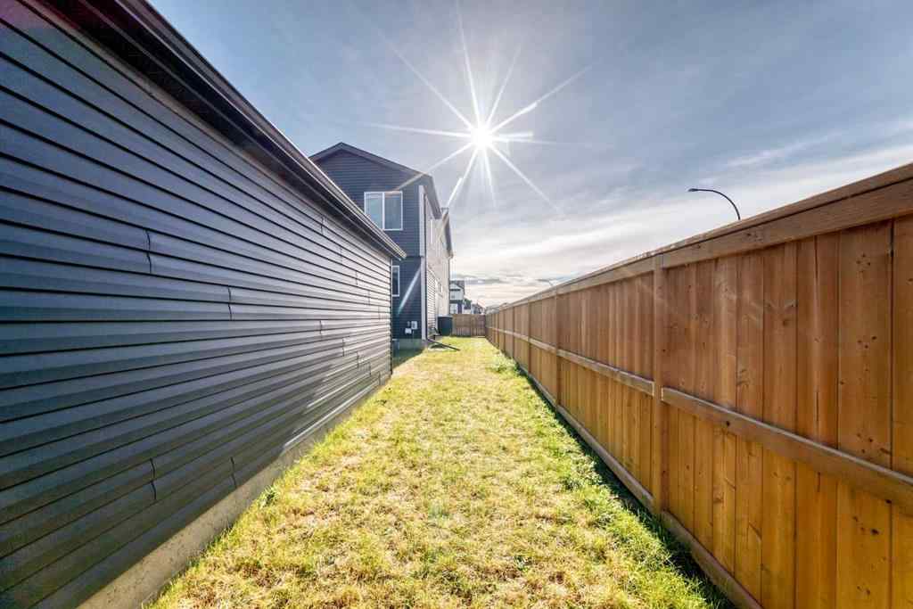 MLS® A2266305 - 120 Belmont Boulevard SW in Belmont Calgary, Residential