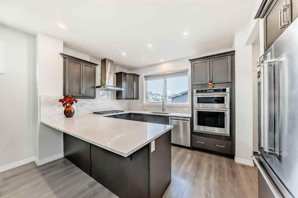 MLS® A2266305 - 120 Belmont Boulevard SW in Belmont Calgary, Residential