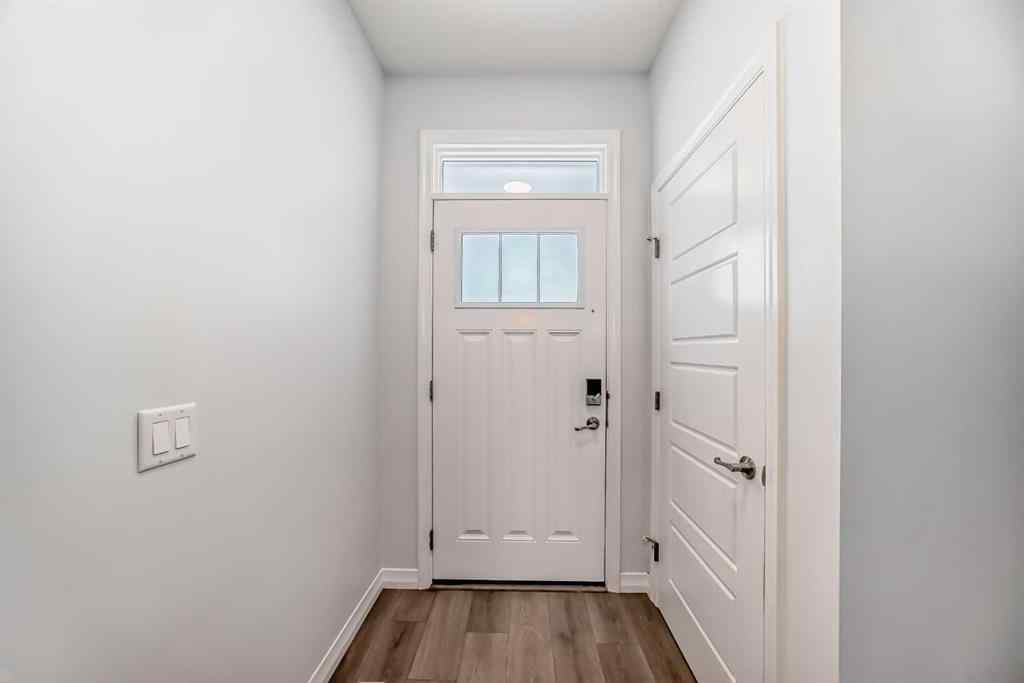 MLS® A2266305 - 120 Belmont Boulevard SW in Belmont Calgary, Residential