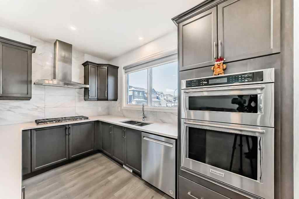MLS® A2266305 - 120 Belmont Boulevard SW in Belmont Calgary, Residential