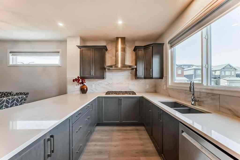 MLS® A2266305 - 120 Belmont Boulevard SW in Belmont Calgary, Residential
