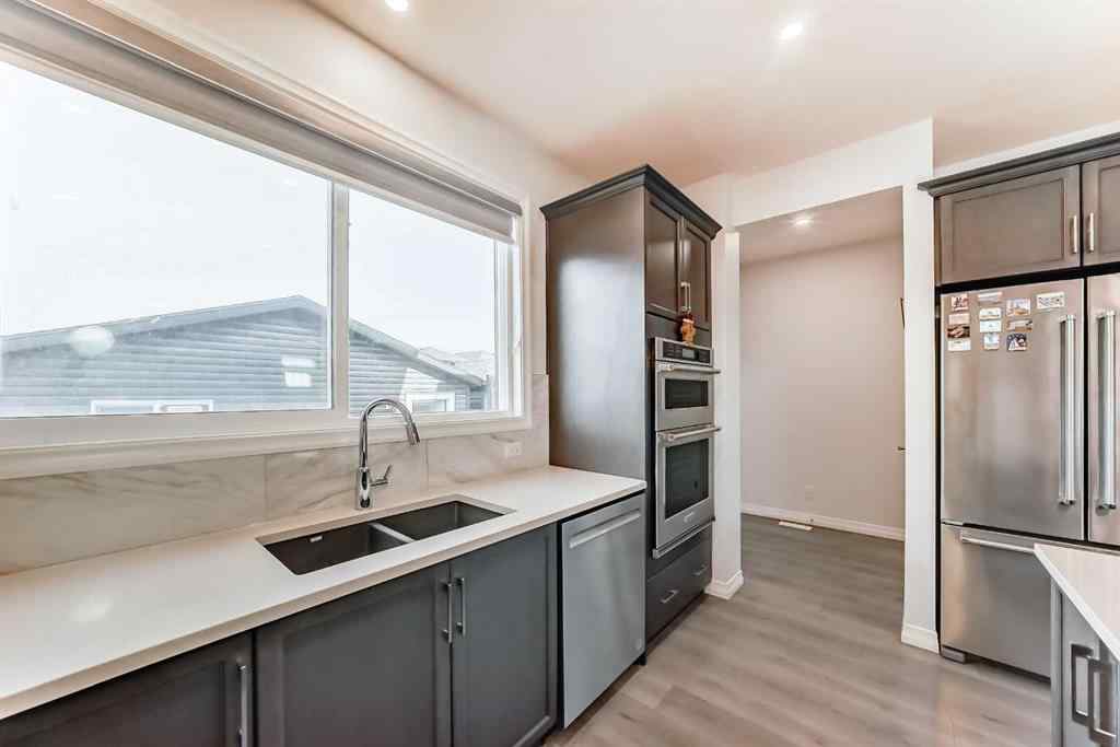 MLS® A2266305 - 120 Belmont Boulevard SW in Belmont Calgary, Residential