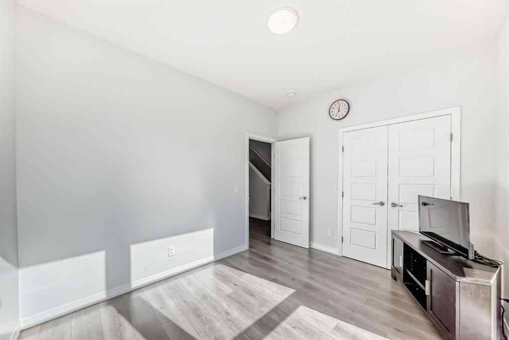 MLS® A2266305 - 120 Belmont Boulevard SW in Belmont Calgary, Residential