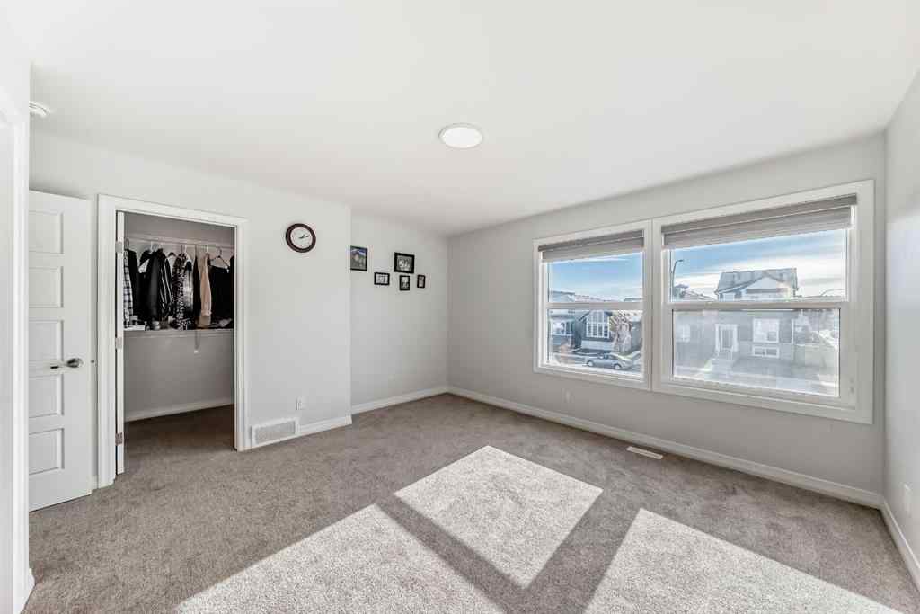MLS® A2266305 - 120 Belmont Boulevard SW in Belmont Calgary, Residential