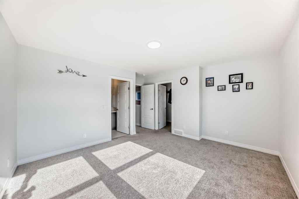MLS® A2266305 - 120 Belmont Boulevard SW in Belmont Calgary, Residential