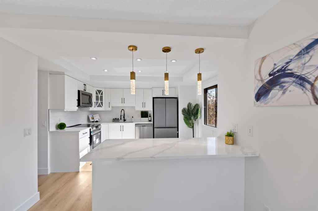 MLS® A2266311 - 26 Glamis Gardens SW in Glamorgan Calgary, Residential