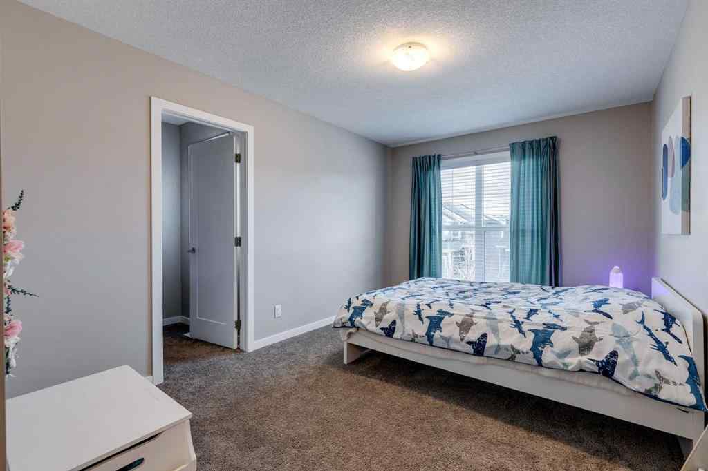 MLS® A2266318 - 106 Magnolia Terrace SE in Mahogany Calgary, Residential