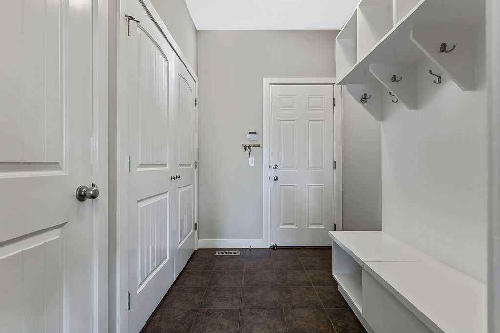 MLS® A2266321 - 14 Crystal Green Grove  in Crystal Green Okotoks, Residential