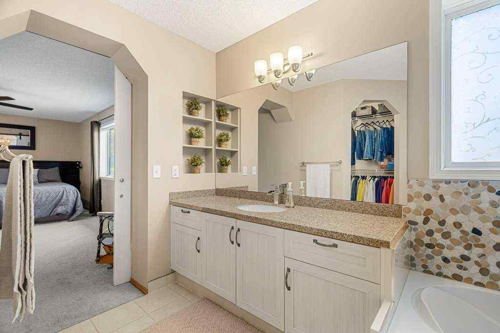 MLS® A2266324 - 151 Mt Gibraltar Heights SE in McKenzie Lake Calgary, Residential