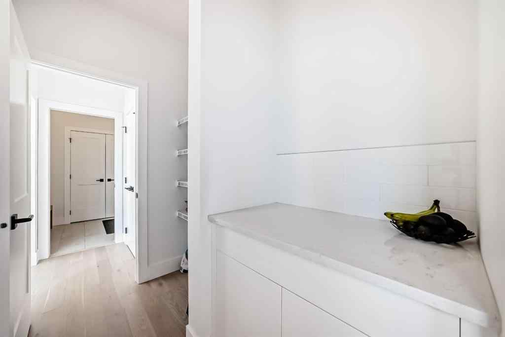 MLS® A2266336 - 26 Treeline Common SW in Alpine Park Calgary, Residential