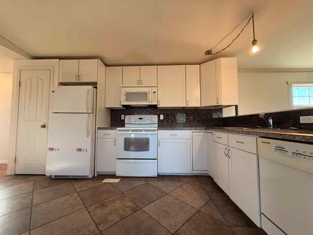 MLS® A2266346 - 1212 Main Street  in NONE Rural, Residential