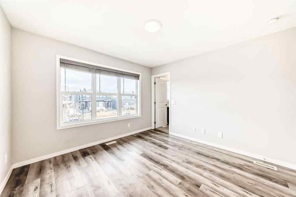 MLS® A2266348 - 1003 Mahogany Boulevard SE in Mahogany Calgary, Residential