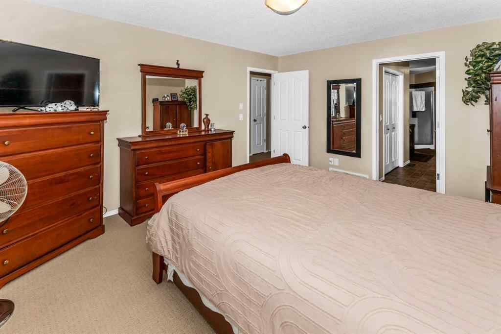 MLS® A2266352 - 107 Everoak Green SW in Evergreen Calgary, Residential