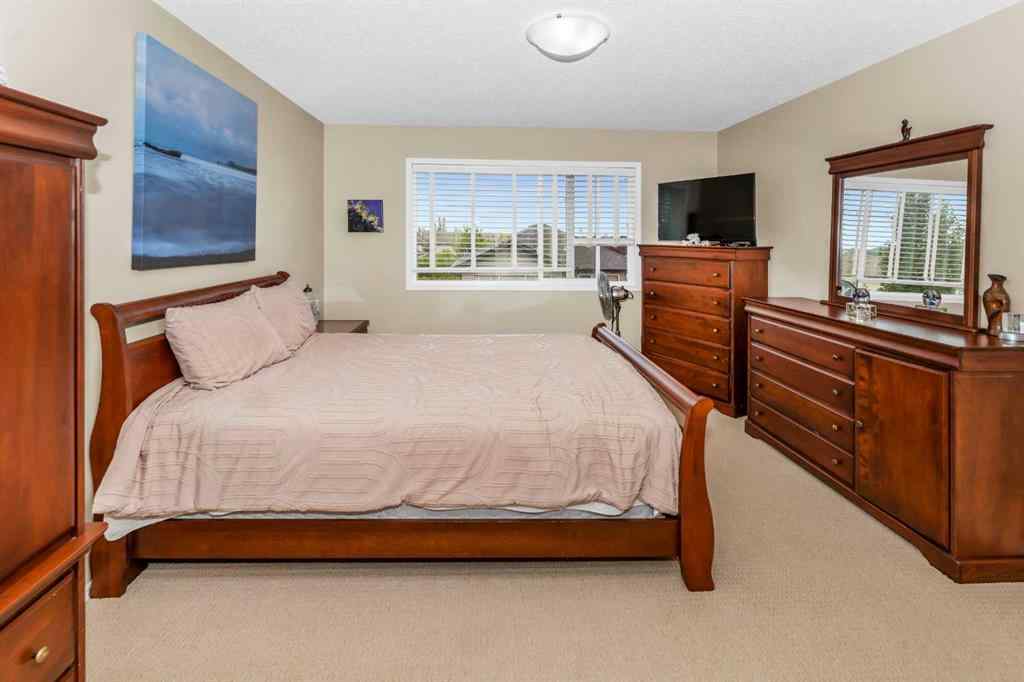 MLS® A2266352 - 107 Everoak Green SW in Evergreen Calgary, Residential