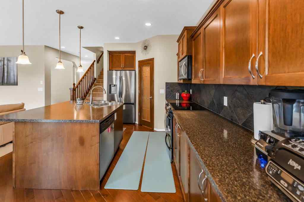 MLS® A2266352 - 107 Everoak Green SW in Evergreen Calgary, Residential