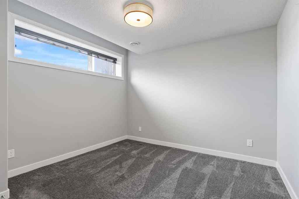 MLS® A2266356 - 105 Elkton Way SW in Springbank Hill Calgary, Residential