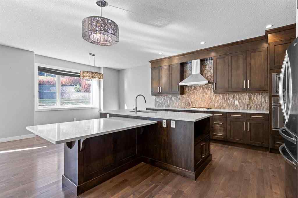 MLS® A2266356 - 105 Elkton Way SW in Springbank Hill Calgary, Residential