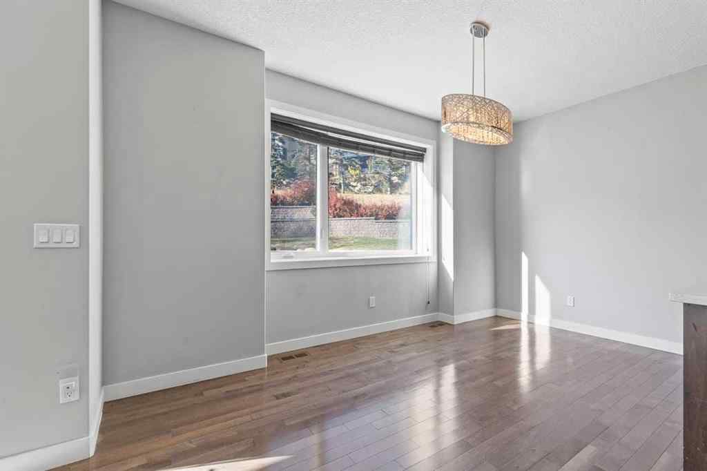 MLS® A2266356 - 105 Elkton Way SW in Springbank Hill Calgary, Residential