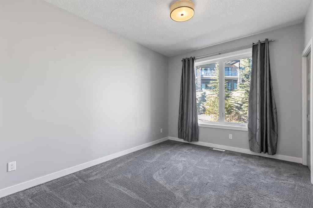 MLS® A2266356 - 105 Elkton Way SW in Springbank Hill Calgary, Residential