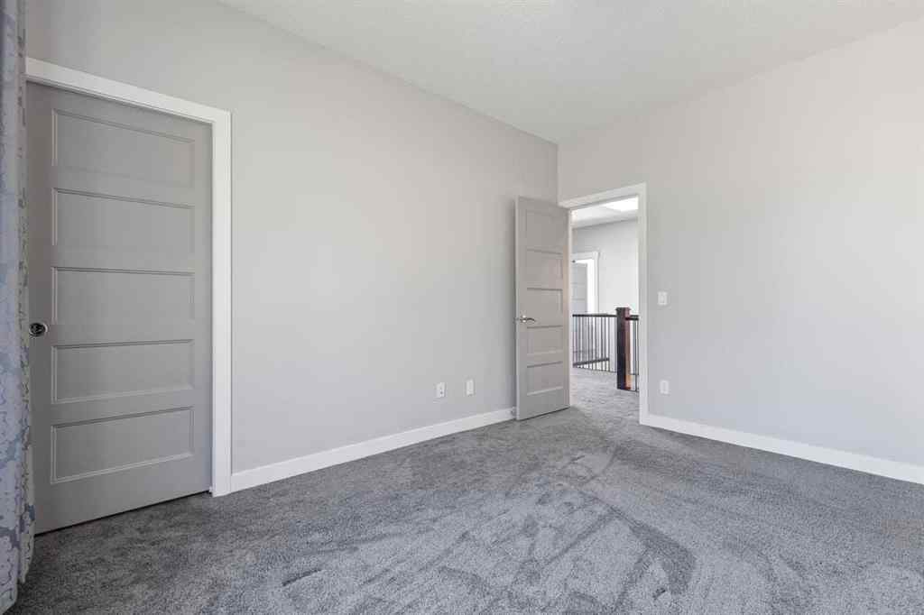 MLS® A2266356 - 105 Elkton Way SW in Springbank Hill Calgary, Residential