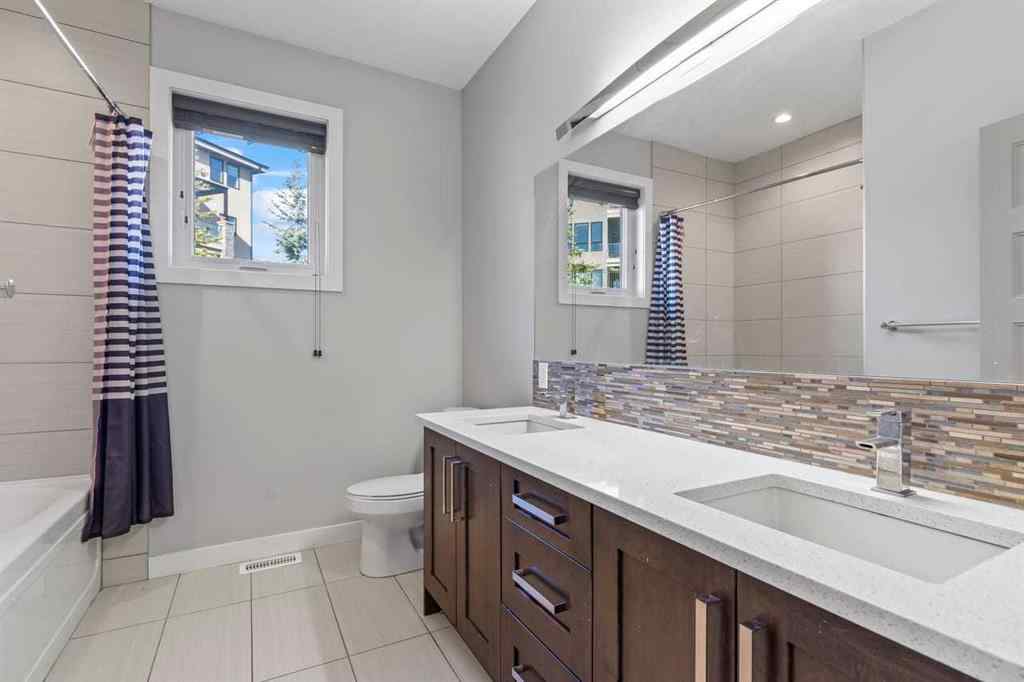 MLS® A2266356 - 105 Elkton Way SW in Springbank Hill Calgary, Residential