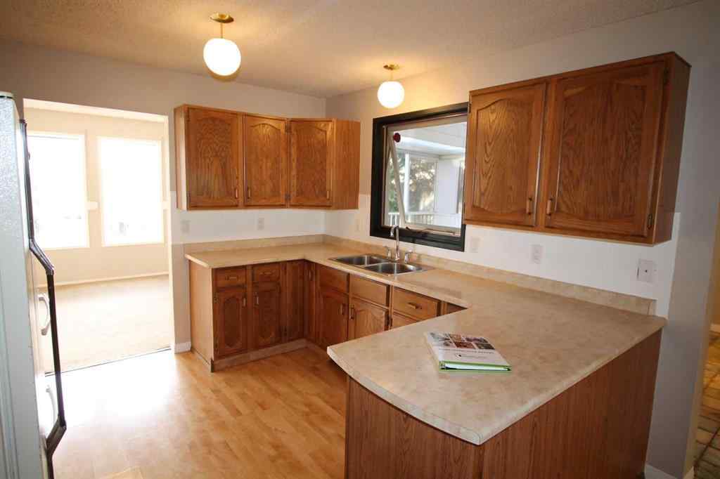 MLS® A2266362 - 107 7A Avenue S in London Road Lethbridge, Residential