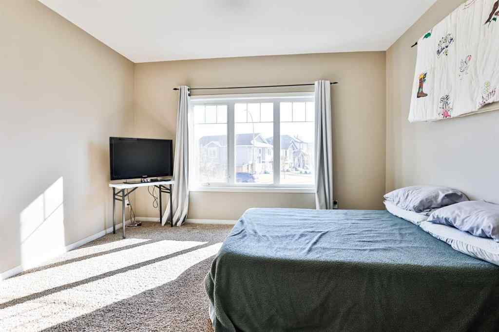 MLS® A2266365 - 887 Keystone Meadows W in Copperwood Lethbridge, Residential