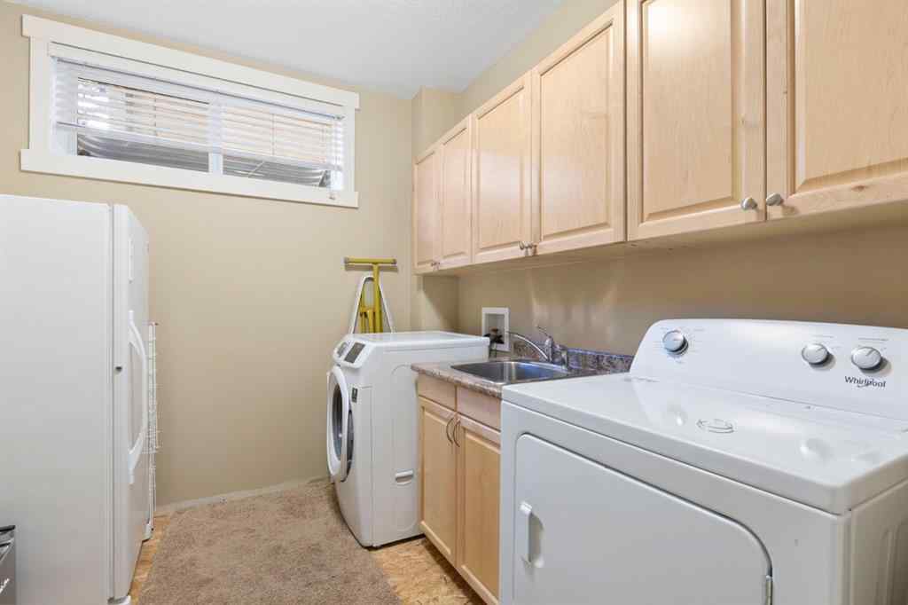 MLS® A2266370 - 5550 Henwood Street SW in Garrison Green Calgary, Residential