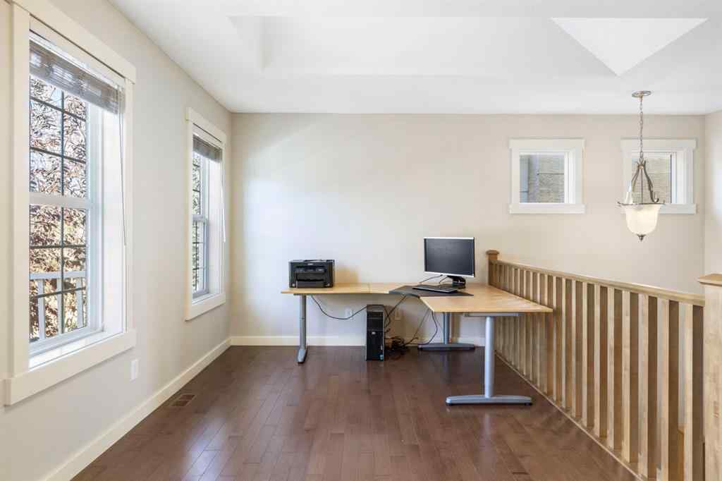 MLS® A2266370 - 5550 Henwood Street SW in Garrison Green Calgary, Residential