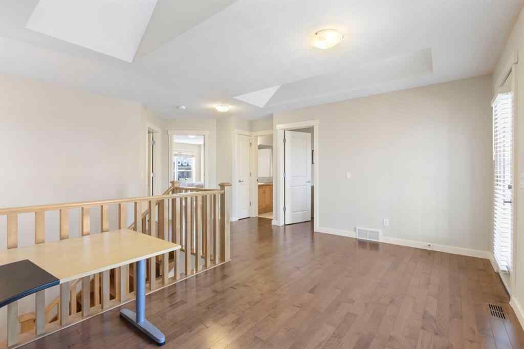 MLS® A2266370 - 5550 Henwood Street SW in Garrison Green Calgary, Residential